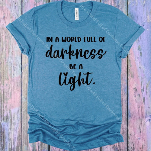 In A World Full Of Darkness Be Light Graphic Tee Graphic Tee